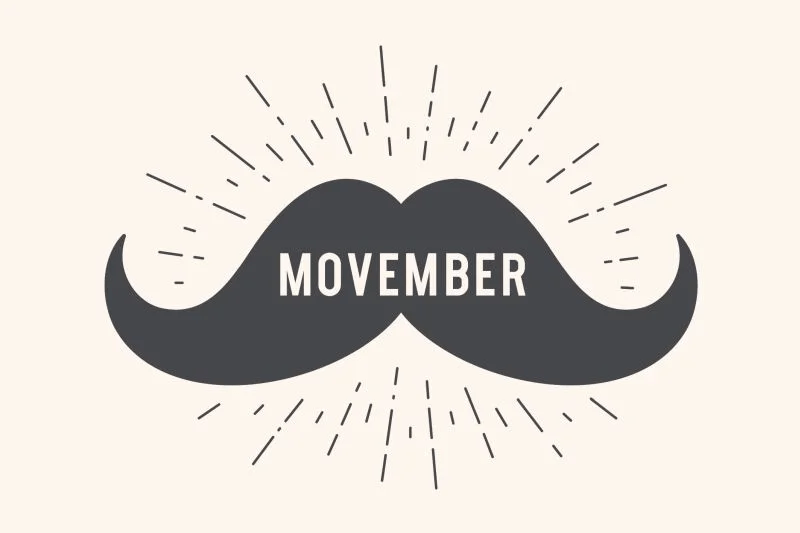 Obrazek promujący Movember - w centrum grafika wąsów z nazwą akcji w centrum